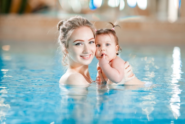 mother and baby swimming
