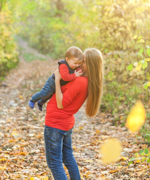 Free Photo | Mom holding tight adorable baby boy