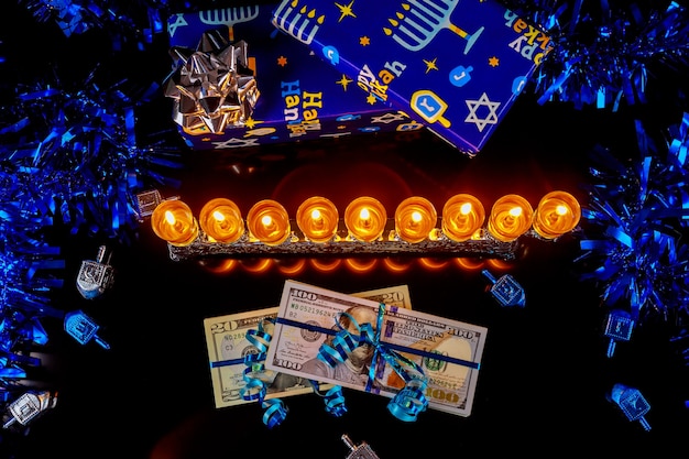 Premium Photo | Money Cash As A Present With Menorah For Hanukkah On ...