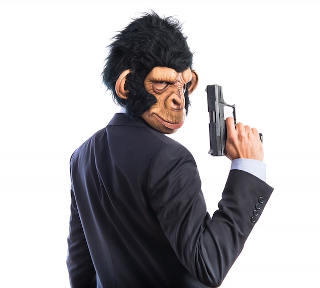 銃を持つ猿の男 無料の写真