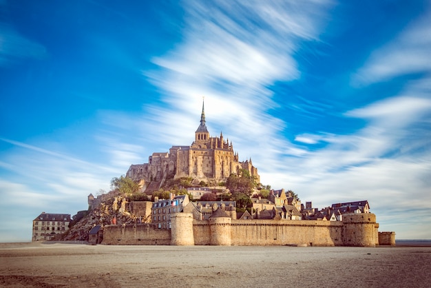 Premium Photo | Mont saint michel and its abbey with the sea at low ...