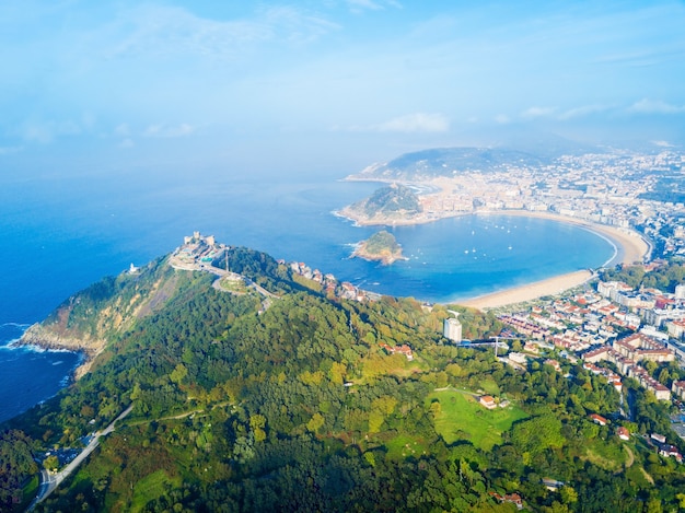 Premium Photo | Monte igueldo tower, viewpoint and amusement park on ...