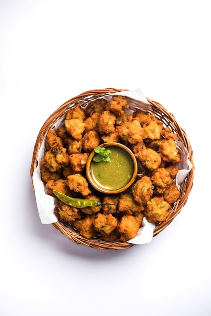 Premium Photo | Moong dal vada or pakoda also known as moongode served ...