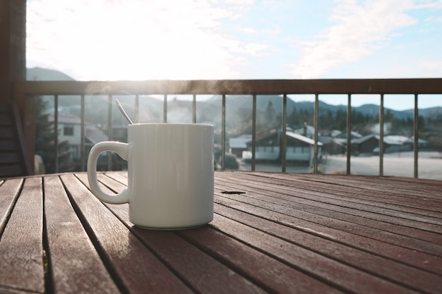 Premium Photo | Morning coffee cup with mountain view