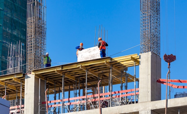 Premium Photo | Moscow, russia: workers at the construction site of new ...