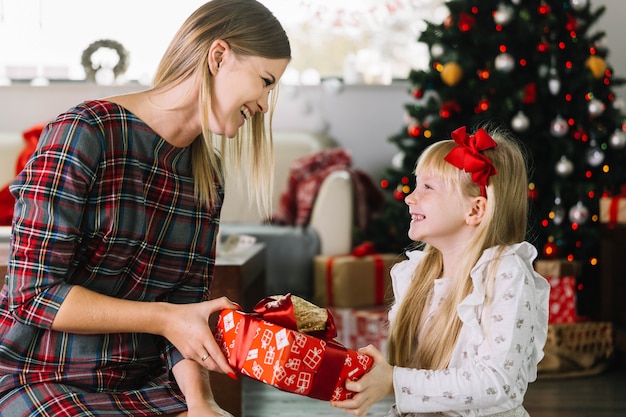 Mother And Daughter With Present Box Photo Free Download