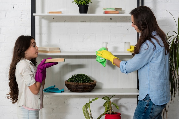 Free Photo Mother And Daughter Cleaning Together