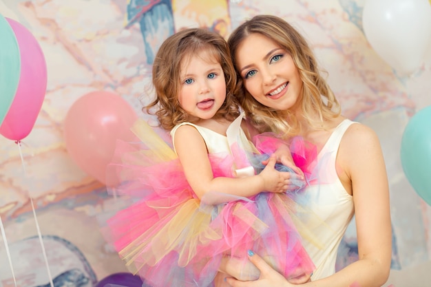 premium-photo-mother-and-daughter-in-a-party