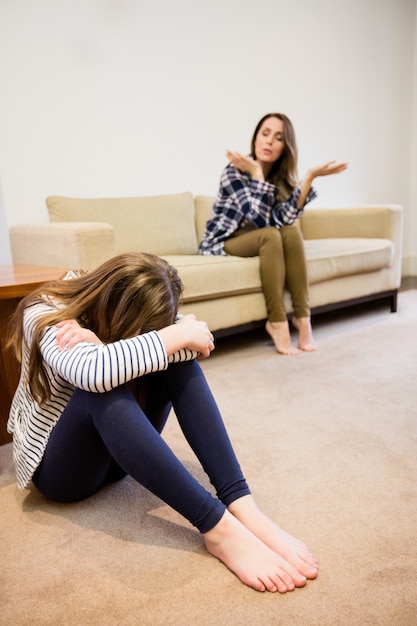 Free Photo Mother Shouting At Her Daughter In Living Room