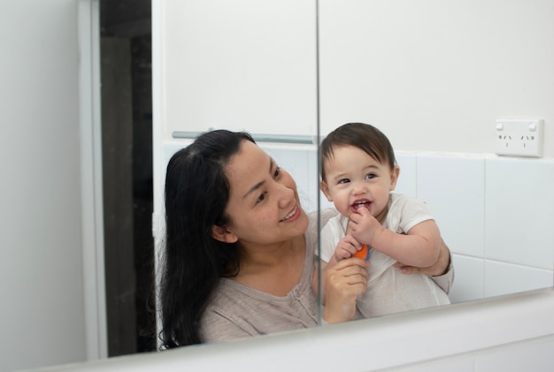 Mother Teach Her Son The Brush His Teeth Photo Premium Download