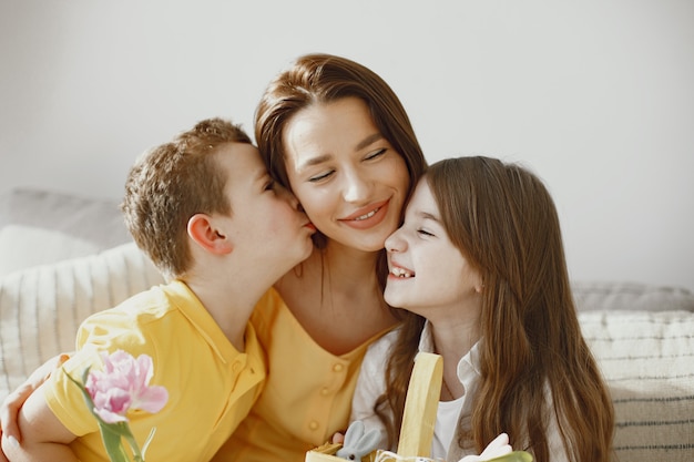 Free Photo | Mother with daughter and son at home. make up a holiday