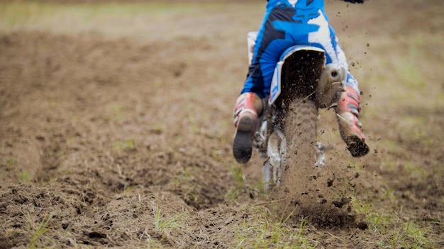 Premium Photo | Motocross racer start riding his dirt cross mx bike ...