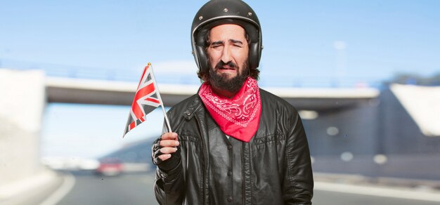 Motorbike rider with england flag Premium Photo