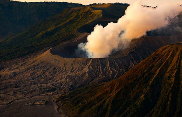  Mount  bromo  an active  volcano with sun shining down east 