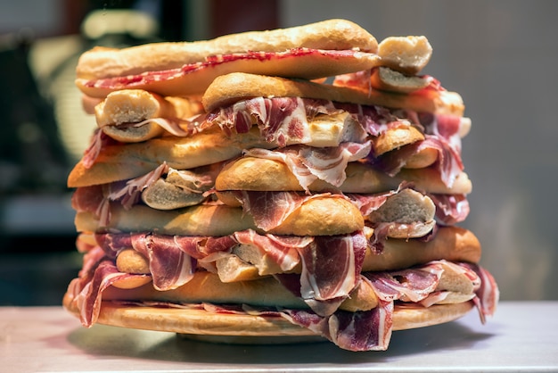 premium-photo-mountain-of-serrano-ham-sandwiches