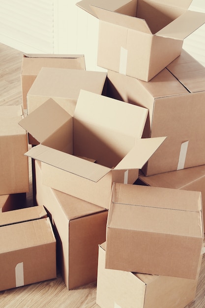 Free Photo | Moving home with cardboard boxes