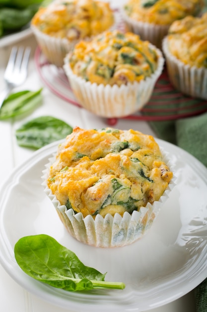 Premium Photo | Muffins with spinach, sweet potatoes and cheese