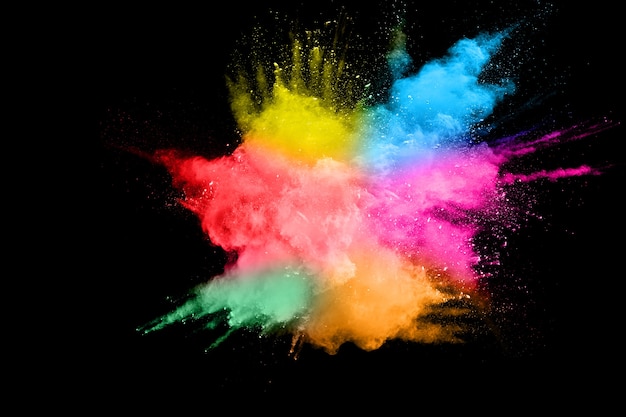 Premium Photo | Multi color powder explosion on black background