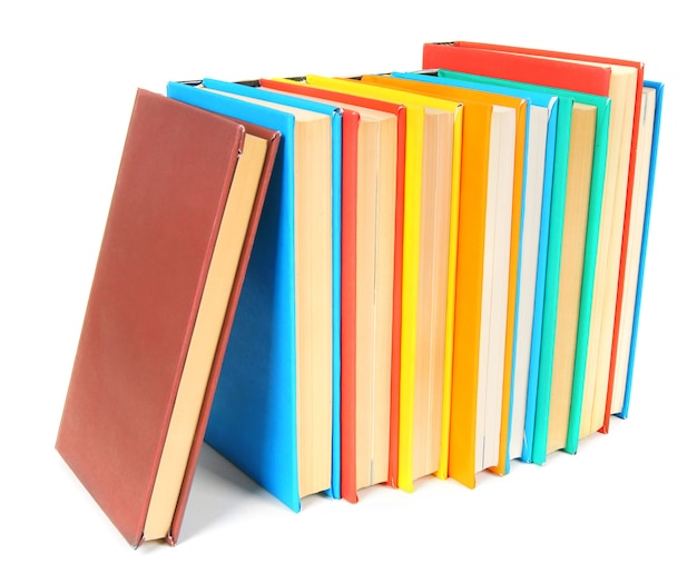 Premium Photo | Multi-coloured books on a white background