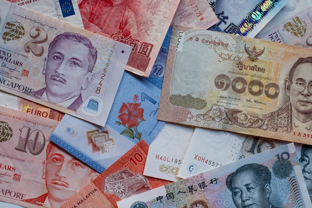 Premium Photo | Multi-country banknotes background.