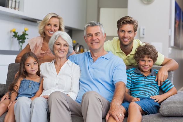 Premium Photo | Multi-generation family posing in the living room