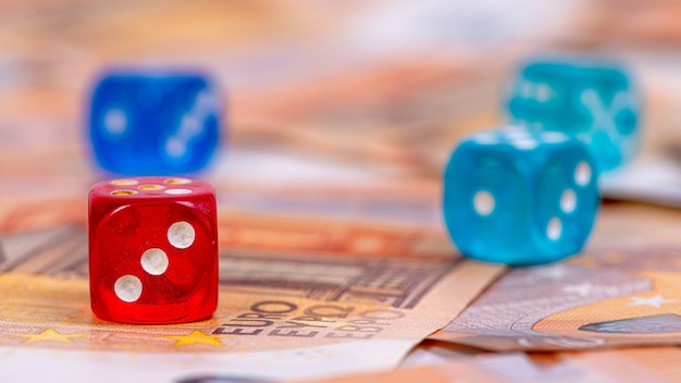 Premium Photo Multicolored Dice Close Up On A Surface Of Euro Banknotes Business Opportunity And Risk Concept