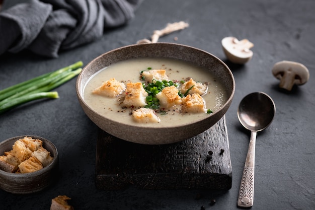 Download Premium Photo Mushroom Cream Soup With Mushrooms And Croutons In A Ceramic Bowl