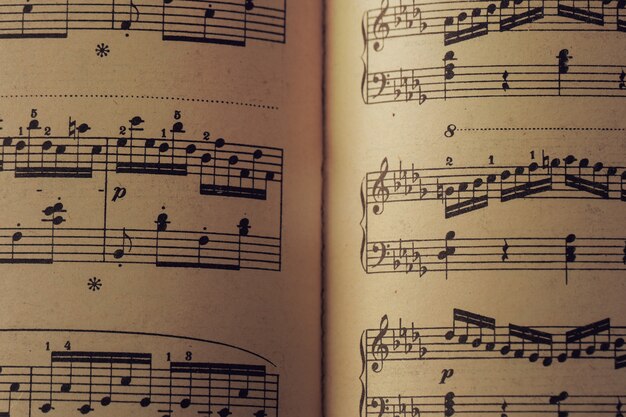 Free Photo | Music notes on scores on score