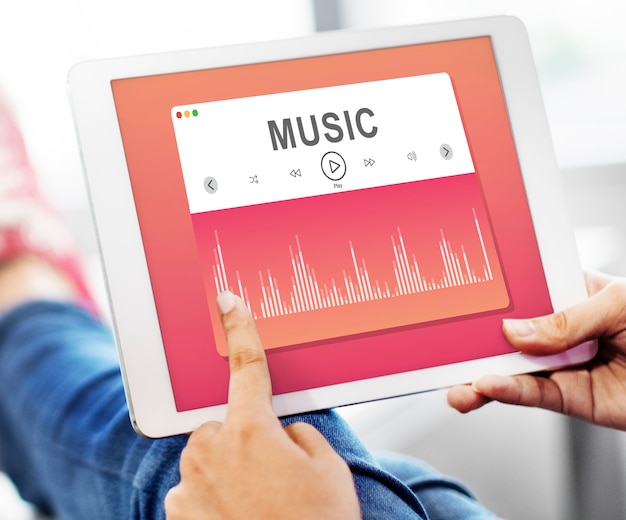 Premium Photo | Music player application showing on a digital tablet