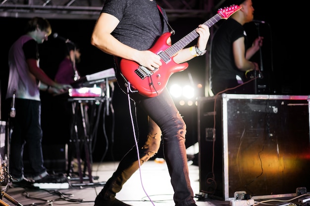 Musicians on stage during a concert Free Photo