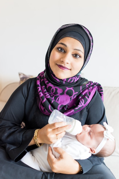 Premium Photo | Muslim mother and baby