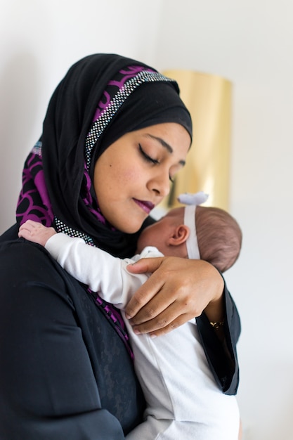 Premium Photo | Muslim mother and baby