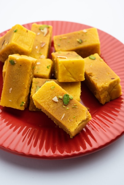 Premium Photo | Mysore pak is an indian sweet prepared in ghee. it ...