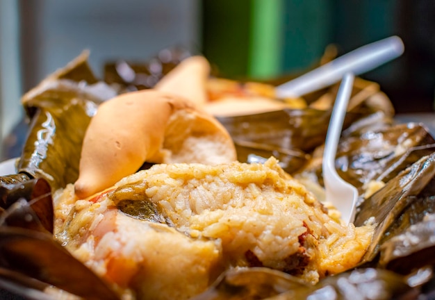 Premium Photo | Nacatamal served in banana leaf close up of nicaraguan ...