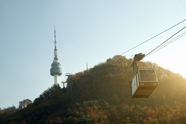 Premium Photo | Namsan n seoul tower with the line of cable car in ...