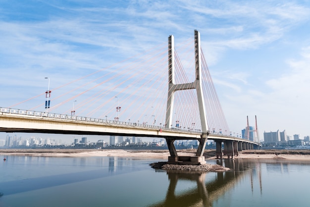 Premium Photo | Nanchang bayi bridge under the blue sky