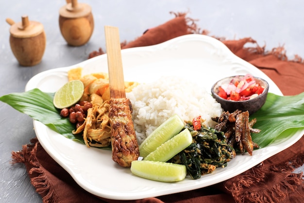Premium Photo | Nasi campur bali. popular balinese meal of rice with ...