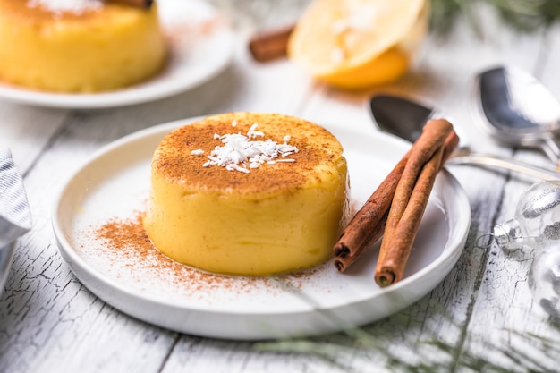 Premium Photo | Natilla colombian or spanish custard pudding and cinnamon