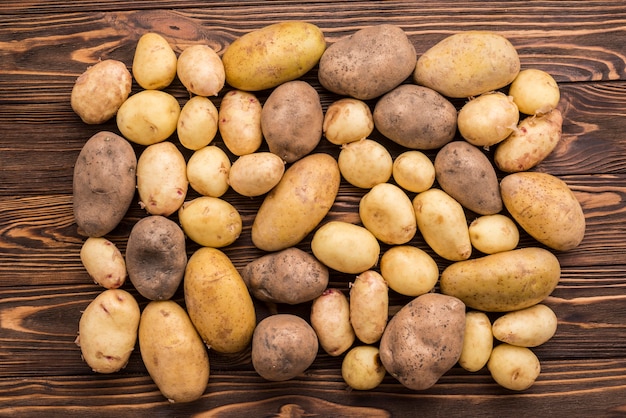 Free Photo | Natural potatoes on floor