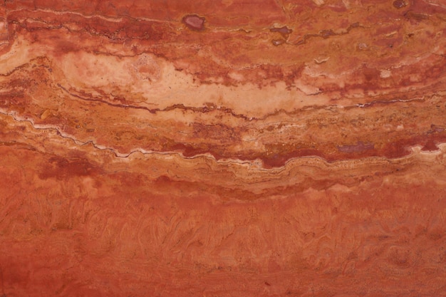  Natural stone of red color, travertine of red color with veins.