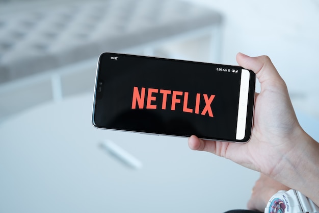 Netflix logo on a tv screen. netflix app on laptop screen ...
