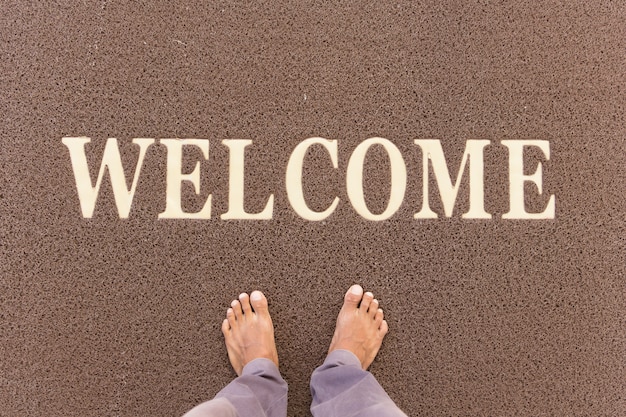 Premium Photo | The new doormat of welcome text