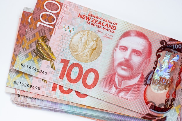 Premium Photo New Zealand Dollars Banknotes On White Background