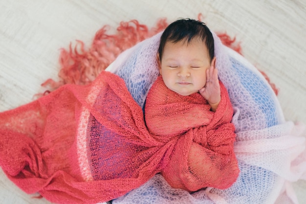 wrapping baby in blanket to sleep