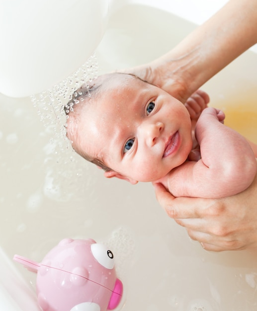 Premium Photo Newborn First Bath