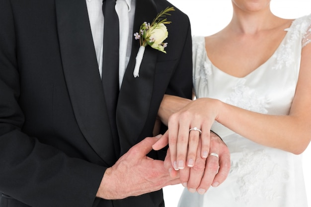 Premium Photo Newlywed Couple Showing Wedding Rings