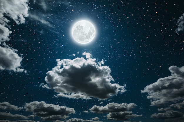 Premium Photo | Night sky with stars and moon and clouds.