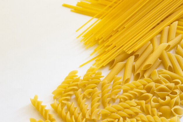 Premium Photo | Noodles and pasta on a white background