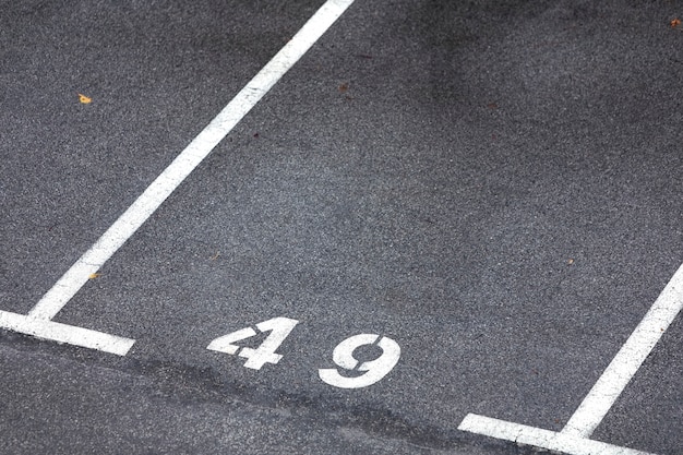 Premium Photo | Numbers of empty parking space