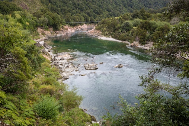 Premium Photo | Nz longest swingbridge over the buller gorge in new zealand